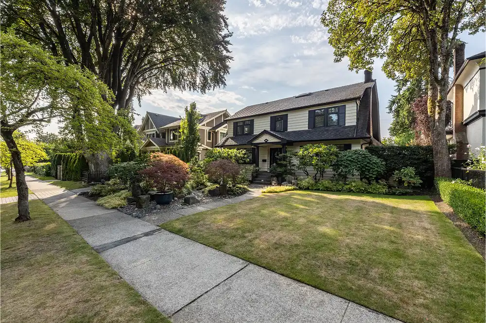 Front lawn, pathway and garden beds at a residential home